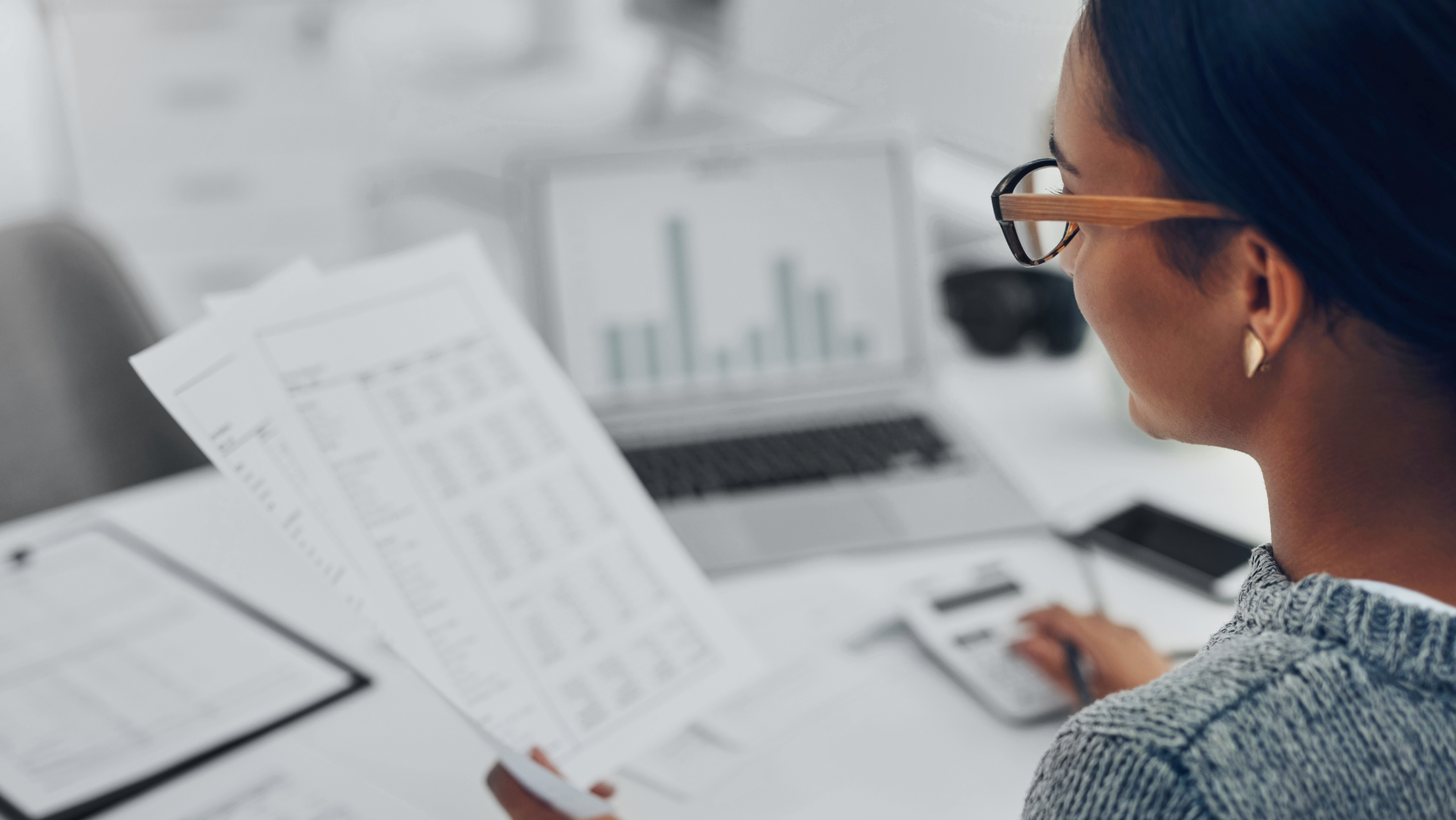 Woman reading payroll content